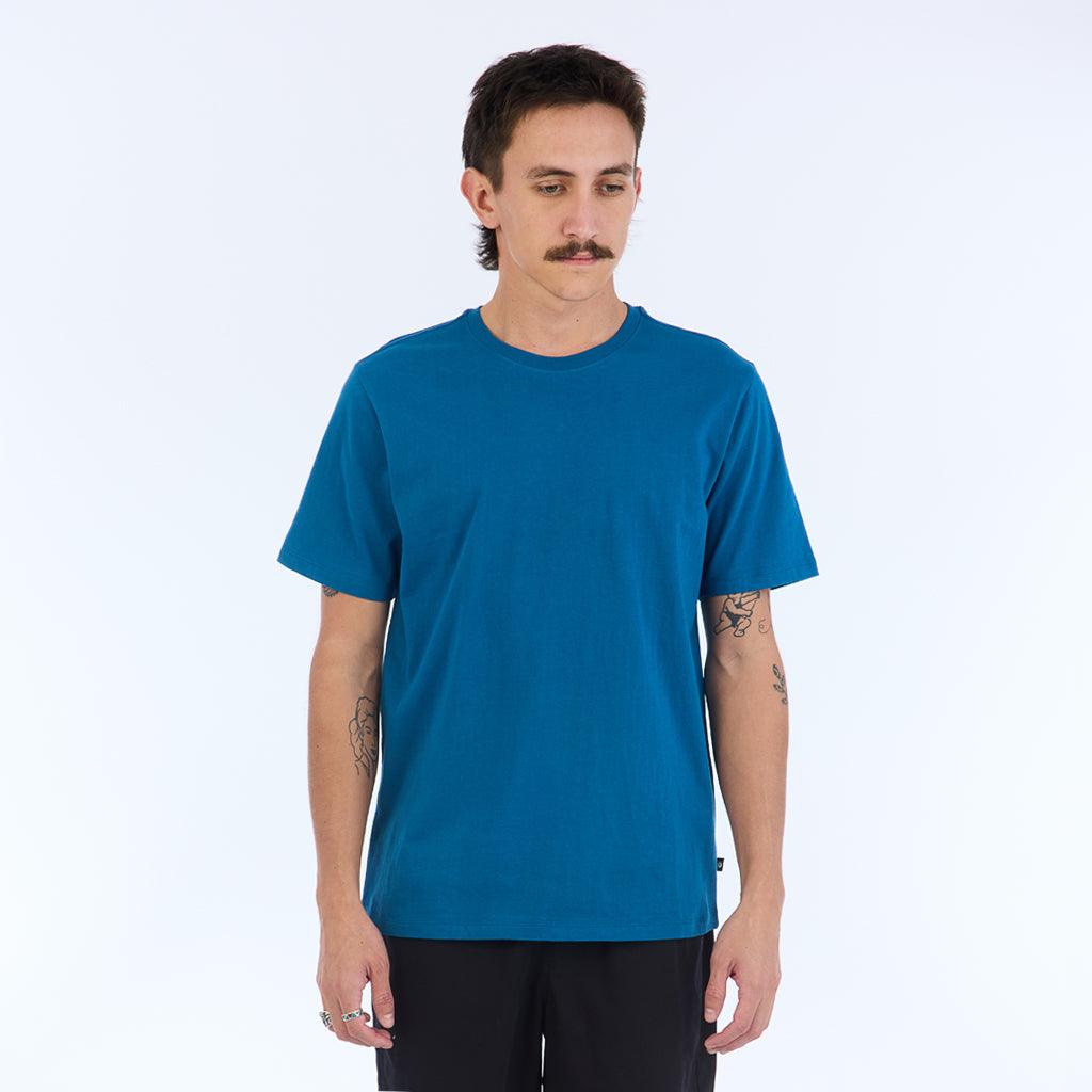 The Foundation Super Soft Tee is our comfortable super soft tee in blue with no logo or branding besides a small square side flag on the ____ seam.