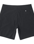 Rear view of simple, solid black boardshorts with a classic style and back pocket with a small I P D logo above it.